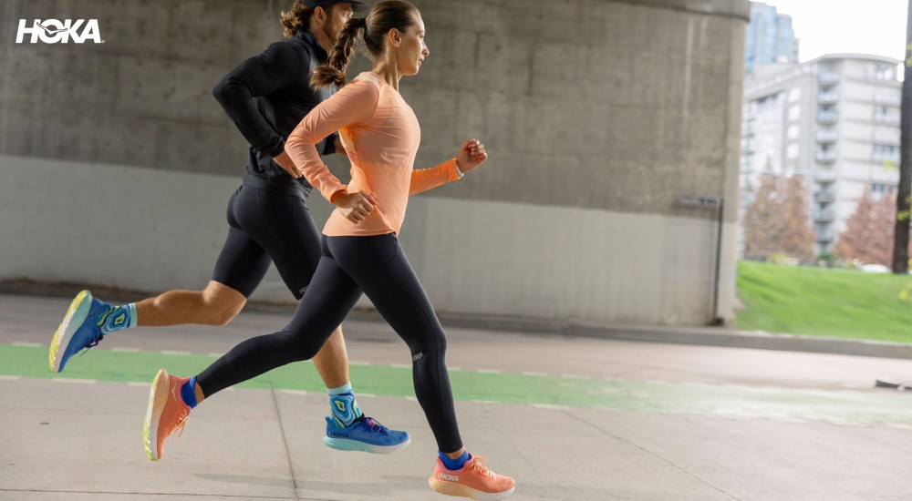 two runners wearing hoka running shoes