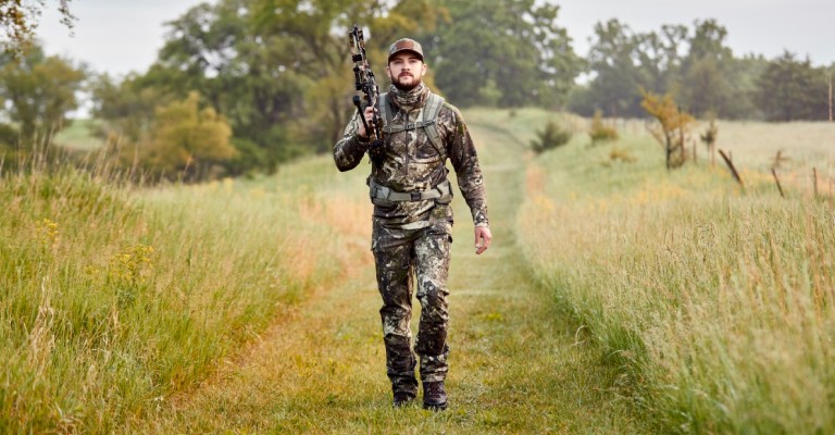 one hunter in the field wearing V2 camo