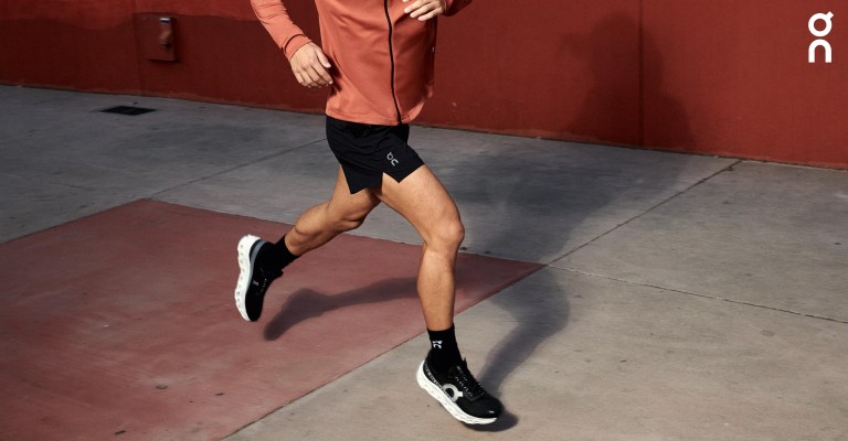a man running in a pair of on shoes