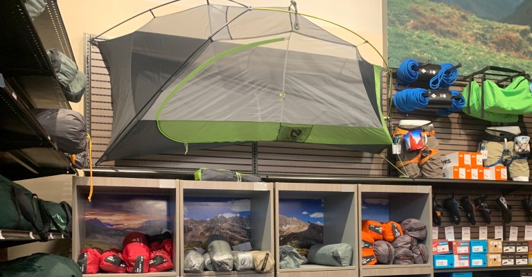 a variety of camping tents at a scheels store