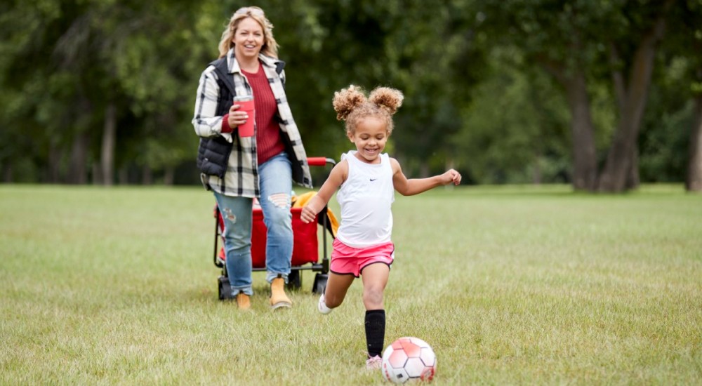 mom and daughter at soccer practice