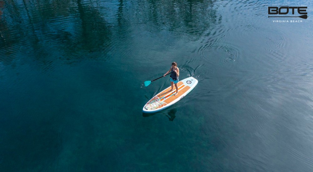 a girl out on her stand up paddle board