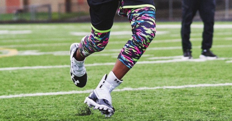 Under Armour kids football cleats