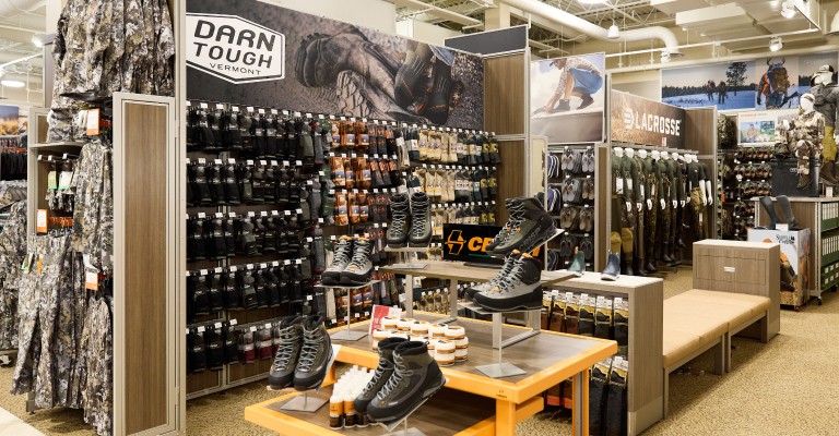 a wall of hunting boots at wichita scheels
